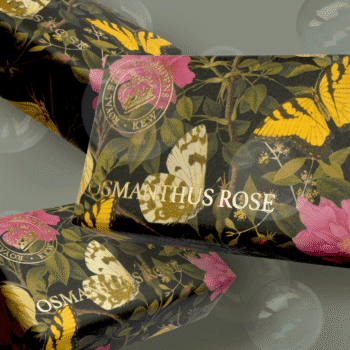 Product packaging with a floral butterfly design and the text 'OSMANTHUS ROSE' visible across the front.
