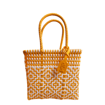 Yellow and white woven tote bag with braided handles and a yellow tag hanging from the side