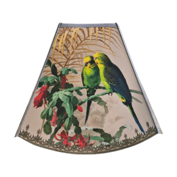 Decorative lamp shade with a botanical scene: two green parrots perched on a branch with leaves and pink flowers